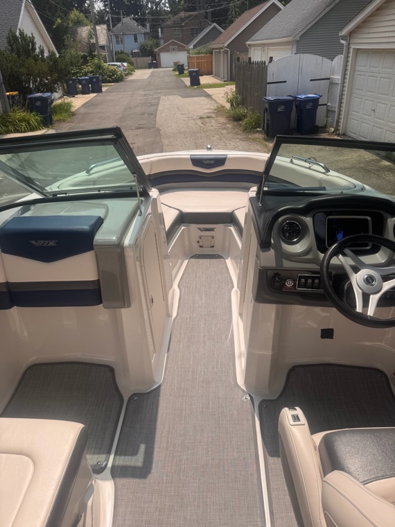 Clean helm and bow seating on a detailed bowrider